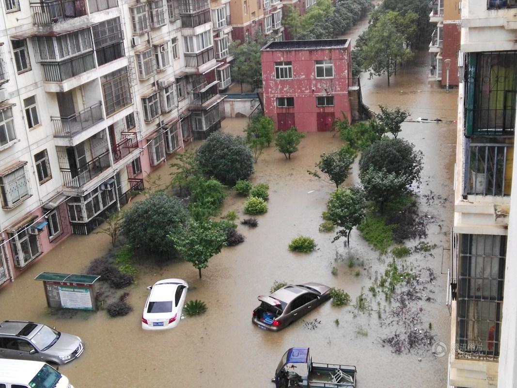 武汉暴雨!围墙坍塌8人遇难 隧道滑坡被堵(多图)