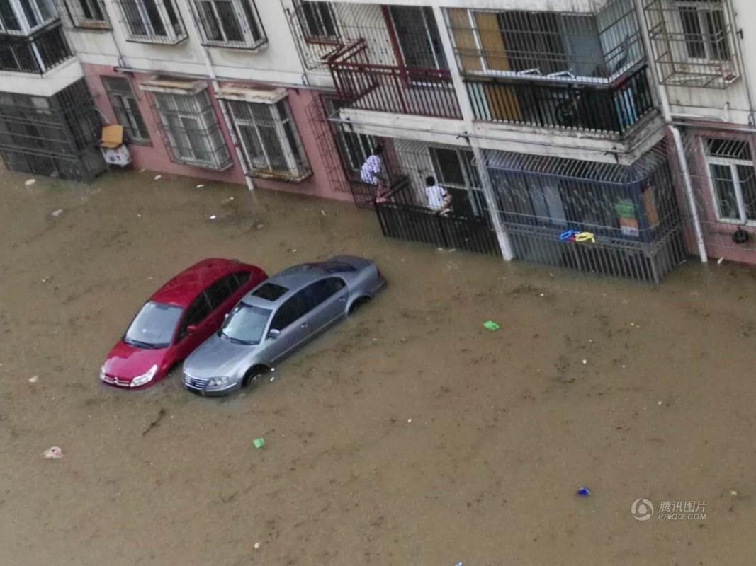 武汉暴雨!围墙坍塌8人遇难 隧道滑坡被堵(多图)