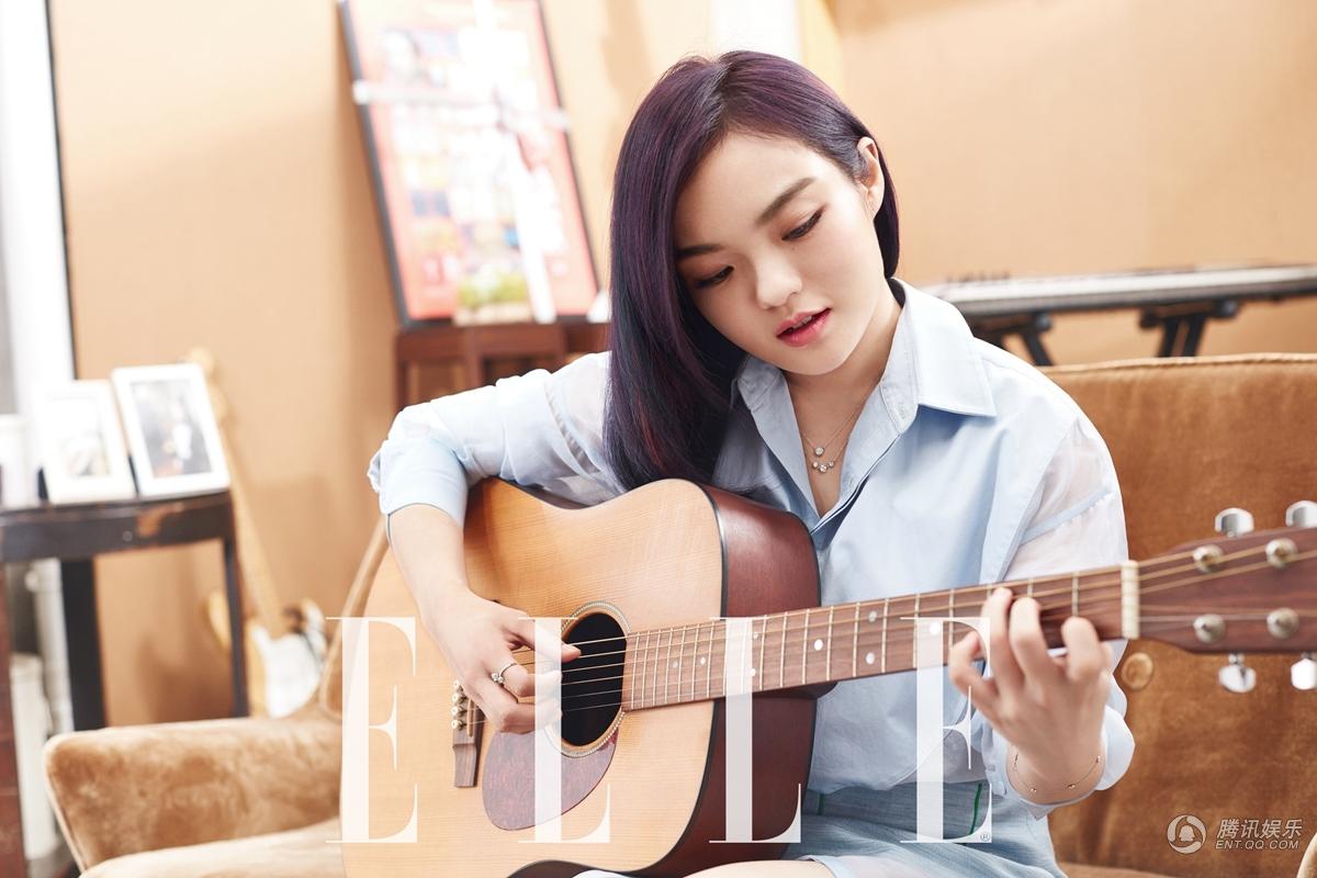 高清:徐佳莹怀抱吉他拍写真 灵动少女烂漫清新 6张