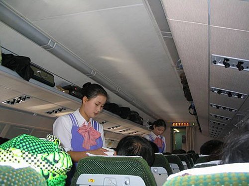 组图:揭秘<em>朝鲜</em>女性的职业装 <em>女兵穿</em>迷你裙_滚