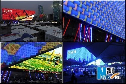 石油馆高清屏直播世界杯球赛 游客驻足喝彩