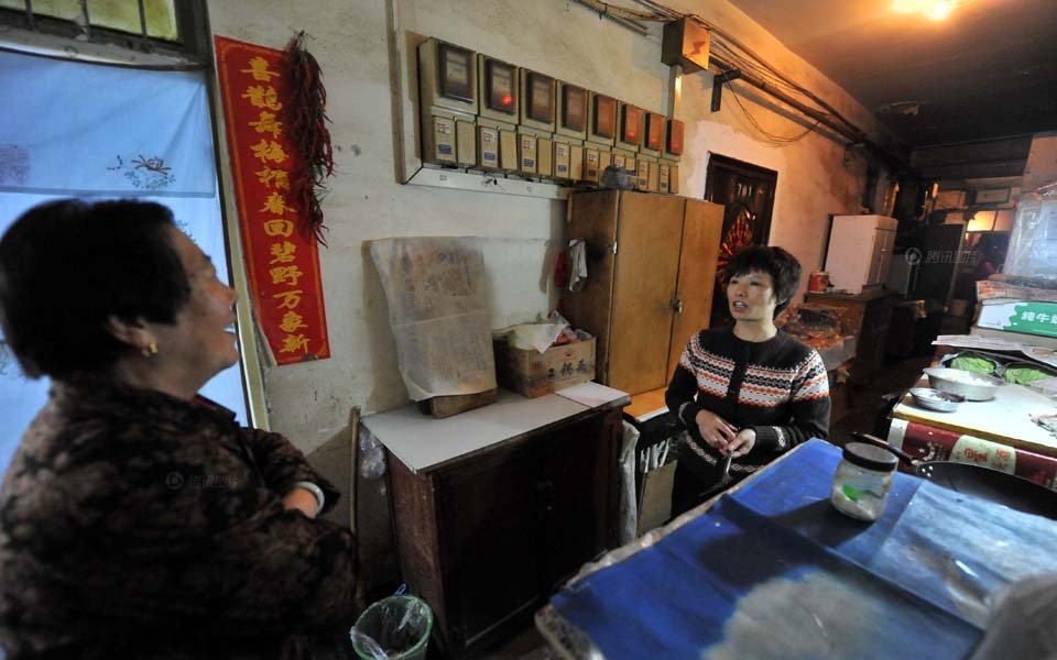 在北京西三环的一个角落,一栋这样的"筒子楼"仍旧安然存在.