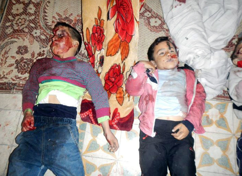 组图:叙利亚霍姆斯发现47具妇孺尸体