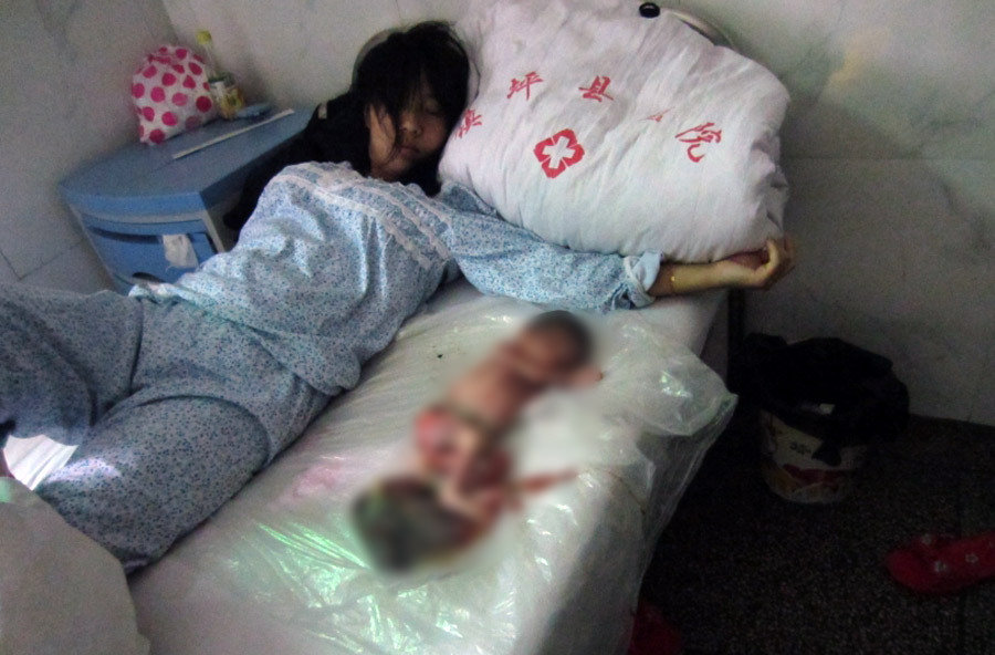 组图:陕西镇坪计生部门强制引产7月大胎儿