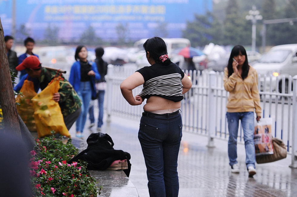 高清图:贵阳街头<em>裸女</em>漫步引市民围观- 中国日报