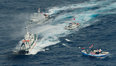 台湾“海巡署”舰艇与日舰互射水炮