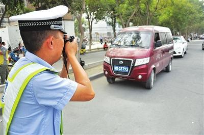 遇交警拍照这样做可避免处罚 方法很重要