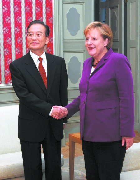 亚欧峰会早退 默克尔回家迎温家宝