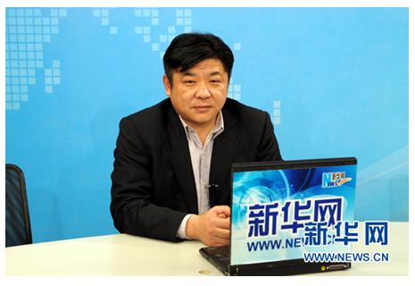 江苏丰县县委副书记梁伟做客新华网谈转变发展