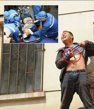 El hombre perdió el control de Harbin y la auto-mutilación Shouchijiandao correr por las calles