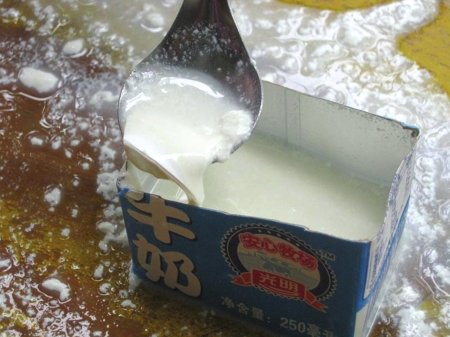 乐山现“豆腐脑”光明牛奶 一孕妇饮后不适-四川新闻-新闻资讯- 果城网景 Sc0817.Com