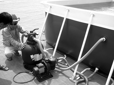 成都移动游泳池营业 围观者多体验者少(图)_新