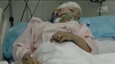 利比亚空难中唯一幸存男孩开口讲话(组图)_国