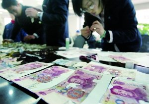 如何兑换残损钞票?银行人士为您详细解答