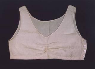 民国时束胸使用一种"小马甲",也叫"小坎肩",贴身穿着,用纽扣固定,将