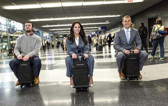 不怕赶不上飞机了!骑着行李在机场奔起来_数码_腾讯网