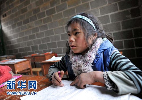 中国网事：“最坚强留守女童” 9岁撑起一个家