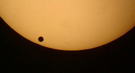 The planet Venus and the Sun