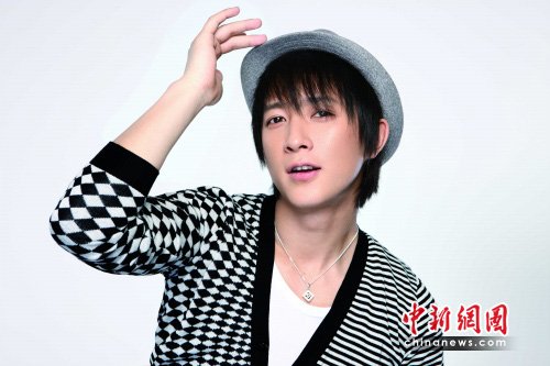 韩庚阳光写真曝光 合约官司将落幕欲单飞(图)