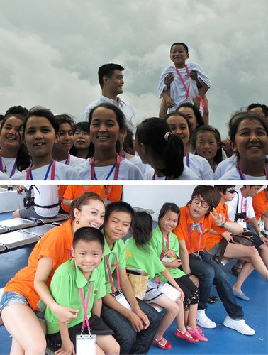 爱心特使原子霏 带留守儿童世博园与姚明比身高