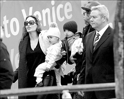 angelina jolie and brad pitt twins down syndrome. Jolie and twins children