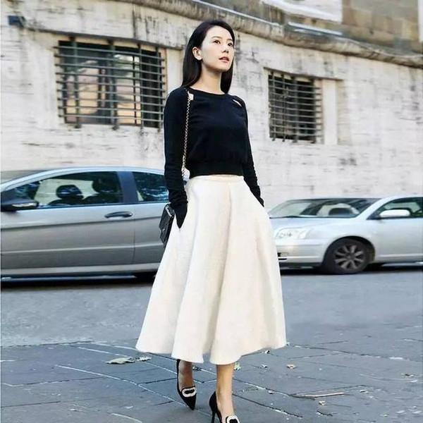 今天穿什么：伞裙为什么一定要配紧身上衣？