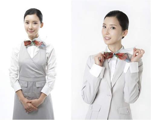 朝鲜空姐首降济南大不同 制服变短变紧了！