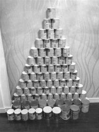 高价回收奶粉罐被指造假 市民宜将空罐毁后再