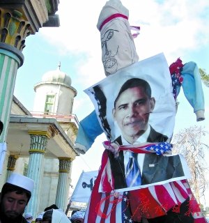 阿富汗政府要求公审焚烧古兰经美军士兵(图)