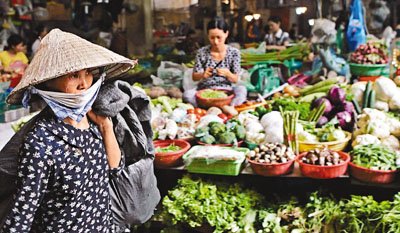 越南通货膨胀创25个月新高 上提最低工资14%