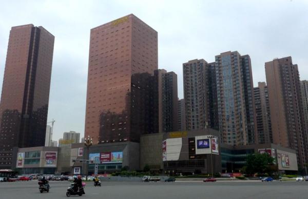国土官员沦为掮客:拎地产商几十斤钞票送区委书记