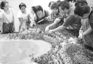 发改委官员称我国将推进房产税改革(附股)
