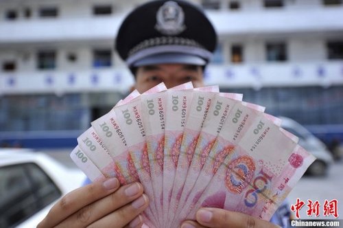 湖北保康现M3W9开头高仿假币 民警提醒防上