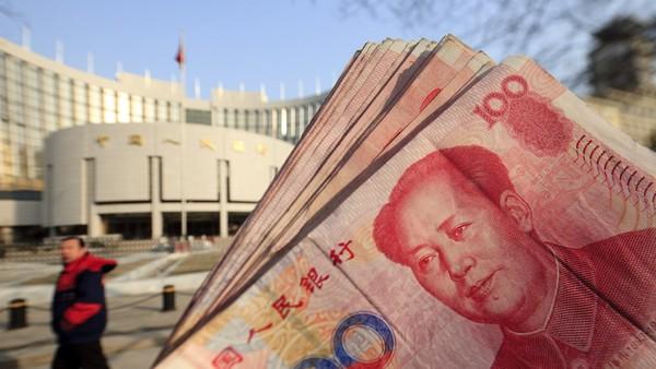 外媒:中国暂停2个对外投资计划 力撑人民币