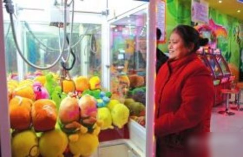 57岁大妈变身游戏厅高玩 三年赢一万游戏币