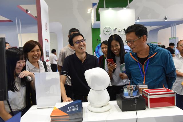 �ڶ����й���У�Ƽ��ɹ����׻�ʢ��Ļ