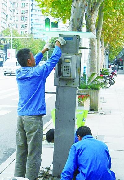 街边IC电话亭被拆除引热议 电信:仅为部分拆除
