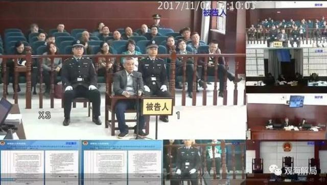 图为:胡祖斌受审