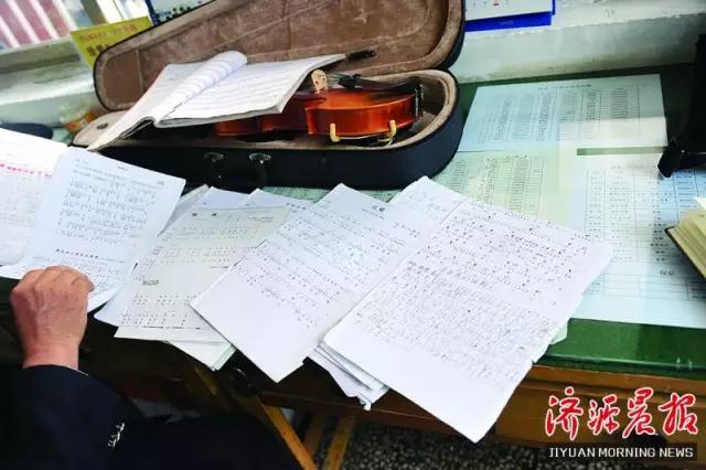 济源五旬保安 文艺值 爆表 自学小提琴走红校园