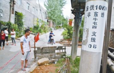 七岁童触碰通信杆拉线身亡 供电所承认是其责任