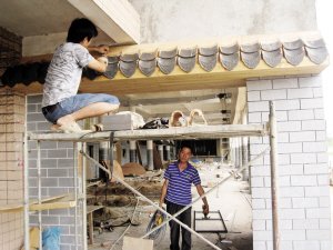 风光带防洪堤上改建茶庄,可否?