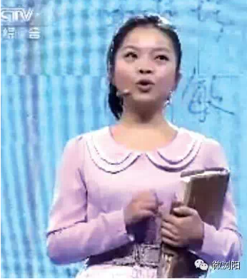抱着记账本上央视 浏阳向日葵女孩感动中国