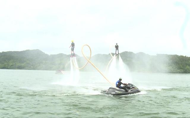 目前,滑水运动还不是一项奥运项目.湘阴湖南龙舟赛图片