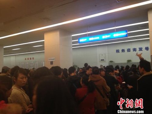 国五条细则掀过户潮 成都市民盼地方细则更完