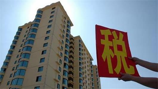 北京有人买一百套房?房产税宜早不宜迟