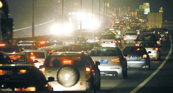 十余年来争议不断 广深高速收费何日能降价?