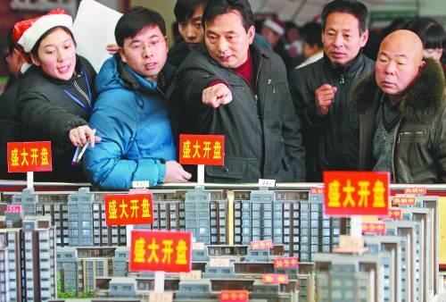 中国鼓励农民进城购房 禁以购房纳税等条件给