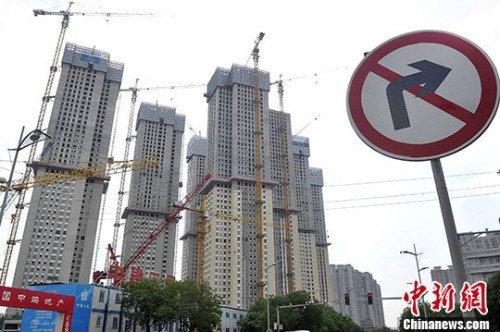 发改委：中国经济不会塌方下滑 房价已有效控制