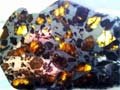 Tá éagsúlacht meteorites ar an Domhan