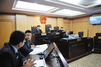 赵薇老公被诉腾房案开庭 法院裁定中止审理
